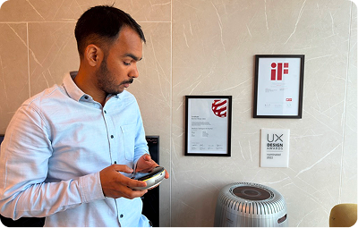 Vineet reviewing an award-winning air purifier product
